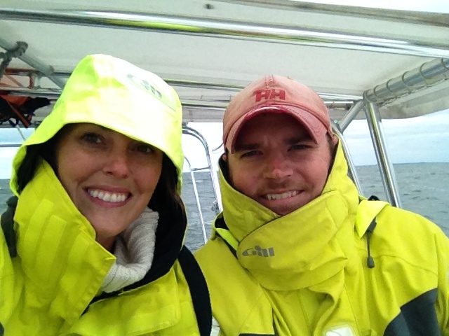 Founders, Matt and Deanna, on a boat in the winter